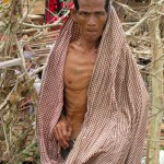 burma_cyclone_victim-thumb-550x732